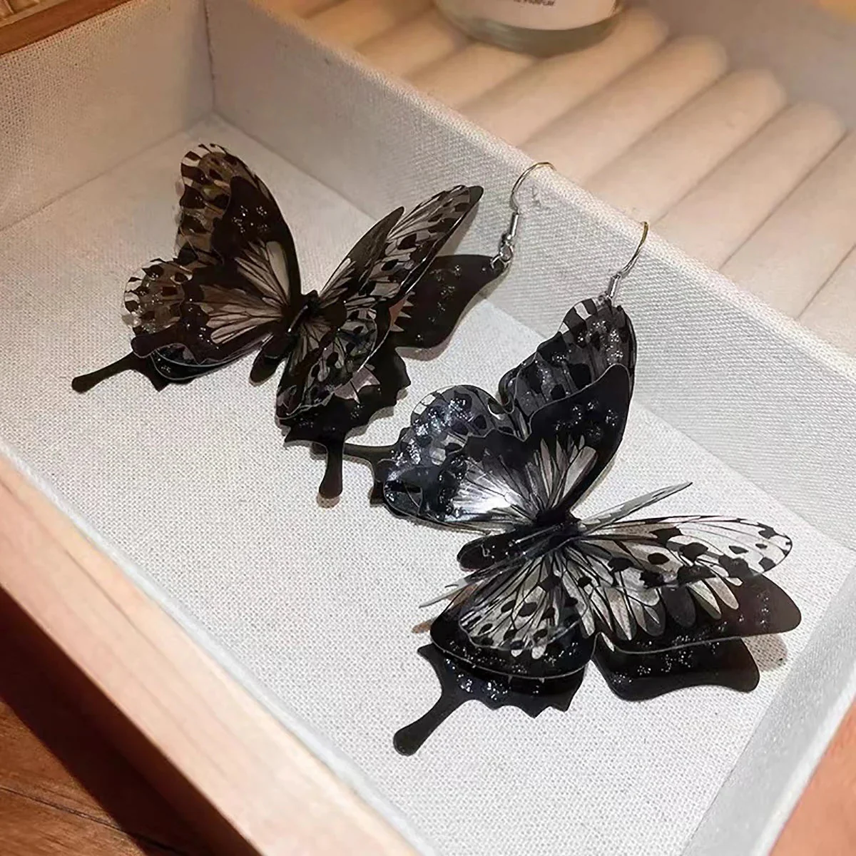 Black Hollow Butterfly Dangle Earrings - Image 3