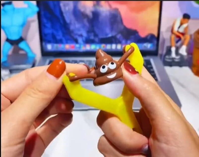 Elastic Poop Emoji Slingshot Toy - Image 4
